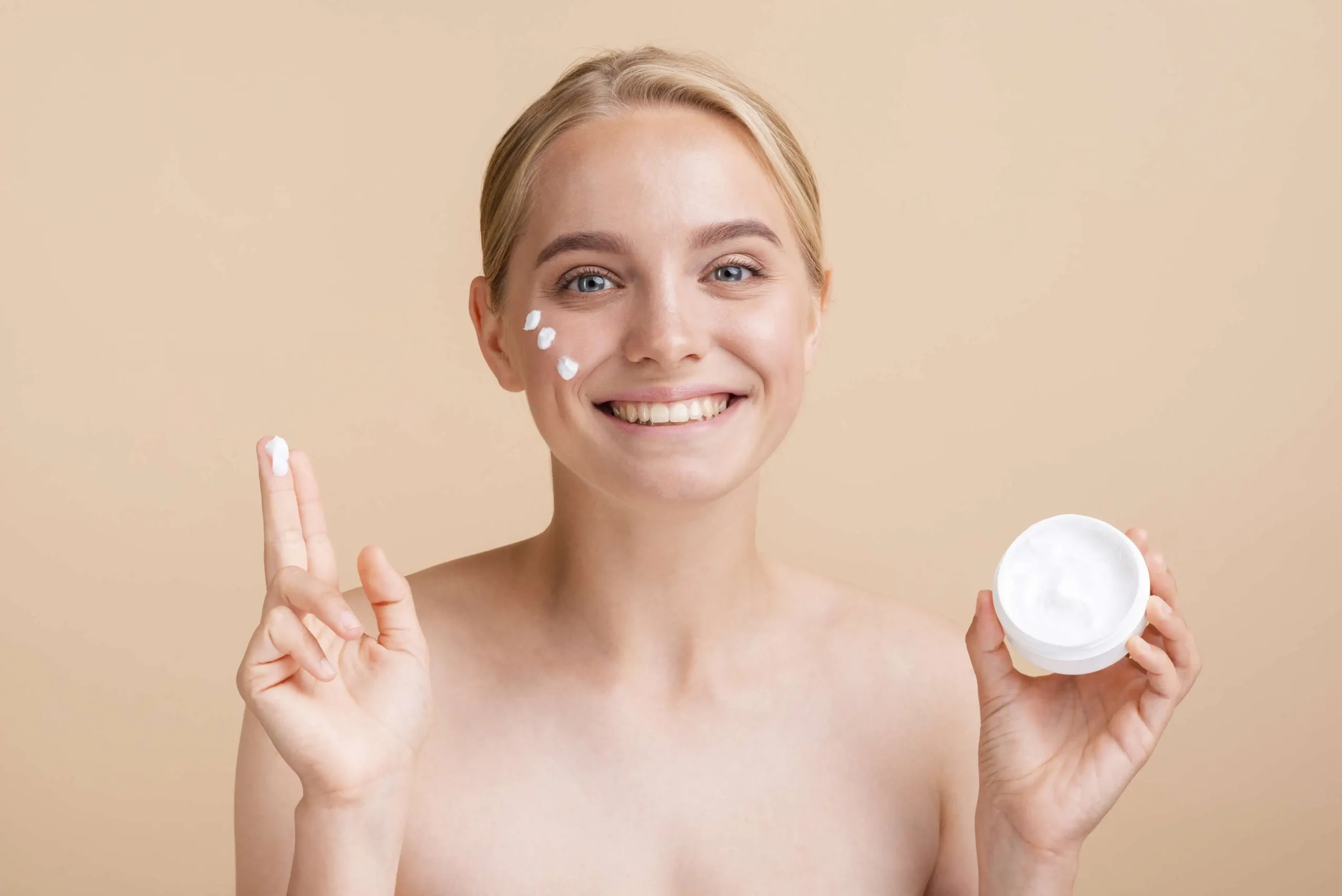 Woman holding face cream jar daily skincare routine with moisturizer as part of a complete product line - Zicail Beauty - Zicail Beauty Woman holding face cream jar daily skincare routine with moisturizer as part of a complete product line - <trp-post-container data-trp-post-id='38'>Skincare Products</trp-post-container> - Skincare Products