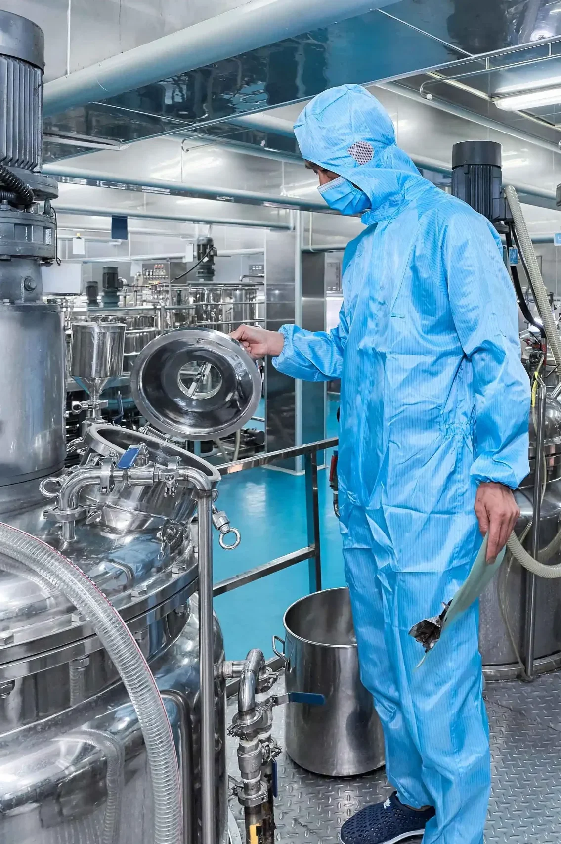 oem odm manufacturing Skincare production staff inspecting stainless steel mixing tanks in a clean manufacturing workshop - Zicail Beauty - Zicail Beauty oem odm manufacturing Skincare production staff inspecting stainless steel mixing tanks in a clean manufacturing workshop - <trp-post-container data-trp-post-id='283'>Brightening Skincare Solutions</trp-post-container> - Zicail Beauty