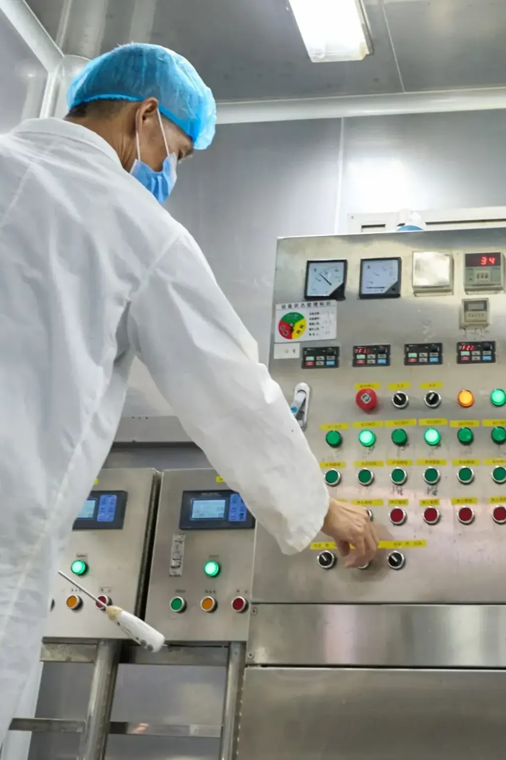 ZICAIL technician recording in-process quality control data during cleansing oil production